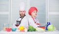 Cooking with your spouse can strengthen relationships. Woman and bearded man culinary partners. Ultimate cooking