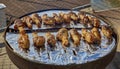 Cookout, chicken on charcoal grill at the marina Brooklyn Bridge Park, Brooklyn New York City, New York USA