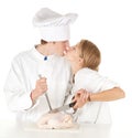 Cooks team preparing raw chicken Royalty Free Stock Photo