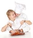 Cooks team preparing raw meat Royalty Free Stock Photo