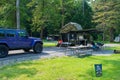 Cooksburg PA - September 17, 2022: Small teardrop travel trailer at a campground