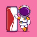 The cool astronaut is standing and posing near the big canned drink