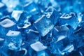 Cool and captivating, scattered ice cubes and water drops on blue