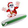 Cool Christmas Santa in Sunglasses Surfing Royalty Free Stock Photo