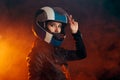 Biker Woman with Helmet and Leather Outfit Portrait Royalty Free Stock Photo