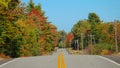 Cool concrete rural path going up and down through the scenic woods of Vermont. Royalty Free Stock Photo