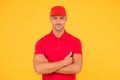 Cool and confident. Confident man keep arms crossed yellow background. Confident look of fashion model Happy guy smile