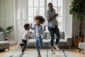 Cool daddy entertaining two children at home Royalty Free Stock Photo