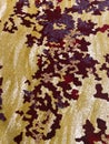 Yellow carpet with dark red abstract prints and cool patterns Royalty Free Stock Photo