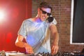 Cool dj spinning the decks Royalty Free Stock Photo