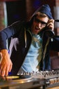 Cool dj spinning the decks Royalty Free Stock Photo