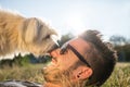 Cool dog playing with his owner Royalty Free Stock Photo
