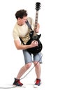 Cool dude guitarist playing his electric guitar Royalty Free Stock Photo