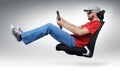 Cool dude with the wheel flies on an office chair Royalty Free Stock Photo