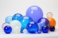 Cool Elegance: Cluster of Blue Glass Balls, A Display of Varied Sizes and Shades