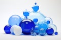 Cool Elegance: Cluster of Blue Glass Balls, A Display of Varied Sizes and Shades