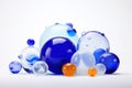 Cool Elegance: Cluster of Blue Glass Balls, A Display of Varied Sizes and Shades