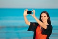 Summer Woman Taking a Selfie at the Beach Royalty Free Stock Photo