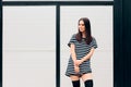 Cool Fashion Girl Wearing Long Black Socks and Shirt Dress Royalty Free Stock Photo