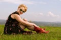 Cool fashionable woman posing wearing dress and shades Royalty Free Stock Photo