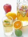 Cool fresh lemonade drink. Refreshing summer sangria. Homemade punch with fresh fruits and mint leaves. Royalty Free Stock Photo