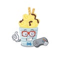 Cool gamer of ice cream banana rolls mascot design style with controller