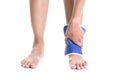 Cool gel pack on a swollen hurting ankle Royalty Free Stock Photo