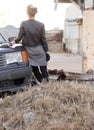 Cool girl by the car Royalty Free Stock Photo