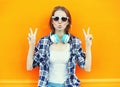Cool girl having fun listens music over colorful Royalty Free Stock Photo