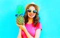 Cool girl with pineapple sunglasses wearing summer hat having fun Royalty Free Stock Photo