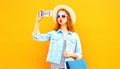 Cool girl takes a picture self portrait on smartphone Royalty Free Stock Photo