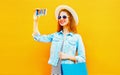 Cool girl takes a picture self portrait on the smartphone Royalty Free Stock Photo