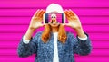 Cool girl taking selfie her face close-up by smartphone Royalty Free Stock Photo