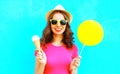 Cool girl with yellow air balloon and ice cream cone Royalty Free Stock Photo