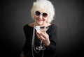 Cool grandma havinga a drink Royalty Free Stock Photo