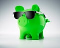 Cool green eco piggy bank with sunglasses