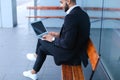 Cool guy arabic man uses laptop business center Royalty Free Stock Photo