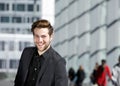 Cool guy smiling in black business suit Royalty Free Stock Photo