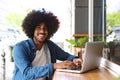 Cool guy working with laptop Royalty Free Stock Photo