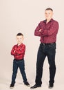 Cool guys. Father little son red shirts family look outfit. Best friends forever. Happiness being father of boy. Dad and Royalty Free Stock Photo