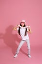 cool hipster little child girl with chewing gum Royalty Free Stock Photo