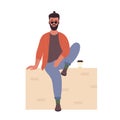 Cool hipster man in sitting pose