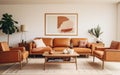 Cool interior design. Mid-century modern living room with tan leather sofa, geometric rug and vintage art prints. Indoor plants. Royalty Free Stock Photo