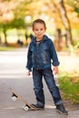 Cool kid playing in park Royalty Free Stock Photo