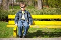 Cool kid sitting on bench Royalty Free Stock Photo