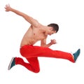 Cool looking dancer makes a difficult jump Royalty Free Stock Photo