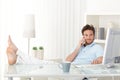 Cool man with feet up on desk Royalty Free Stock Photo