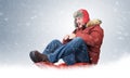 Cool man fly on a sled in the snow, concept winter driving Royalty Free Stock Photo