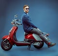 Cool man on a scooter Royalty Free Stock Photo