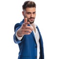 Cool man in suit pointing his finger to camera Royalty Free Stock Photo